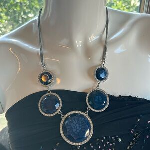 Vintage necklace 70s80s time period on a three stranded chain